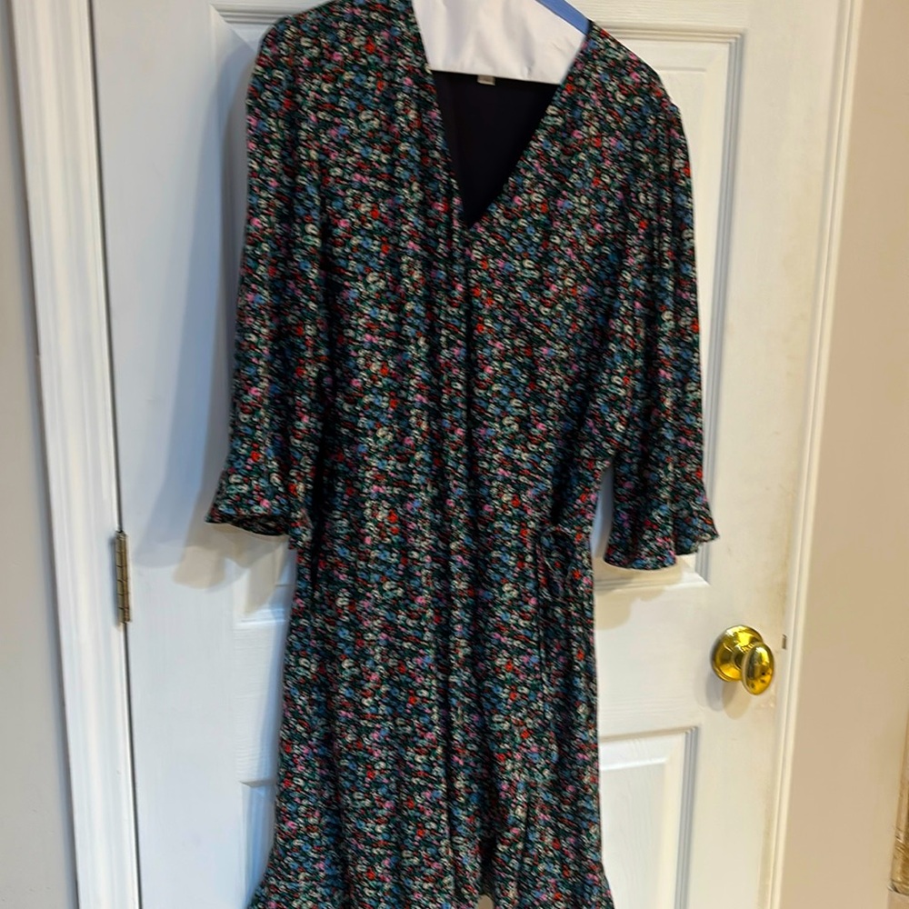 Black romper with pink red and blue flowers